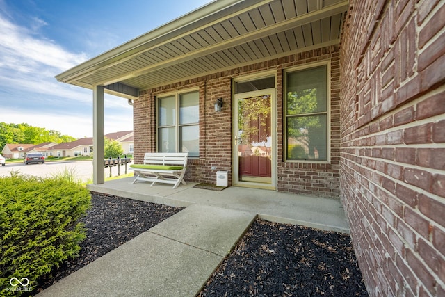 476 Glenview Dr, Greencastle, IN 46135 - doorway to property featuring a porch and brick siding