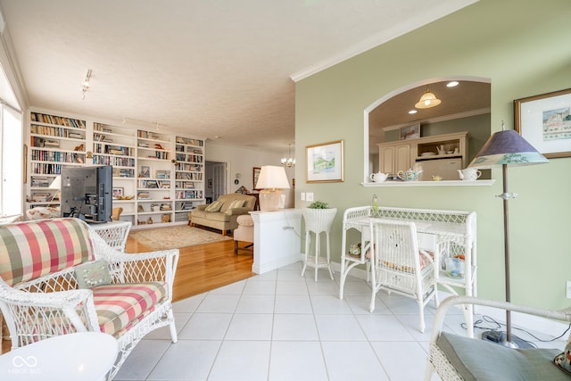 476 Glenview Dr, Greencastle, IN 46135 - tiled living room featuring ornamental molding