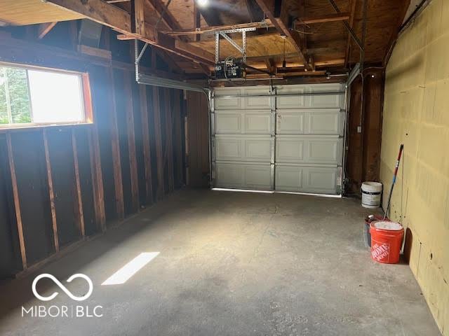 1204 Ladoga Rd, Crawfordsville, IN 47933 - garage featuring a garage door opener