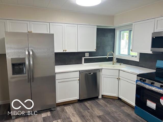 1204 Ladoga Rd, Crawfordsville, IN 47933 - kitchen with appliances with stainless steel finishes and white cabinets