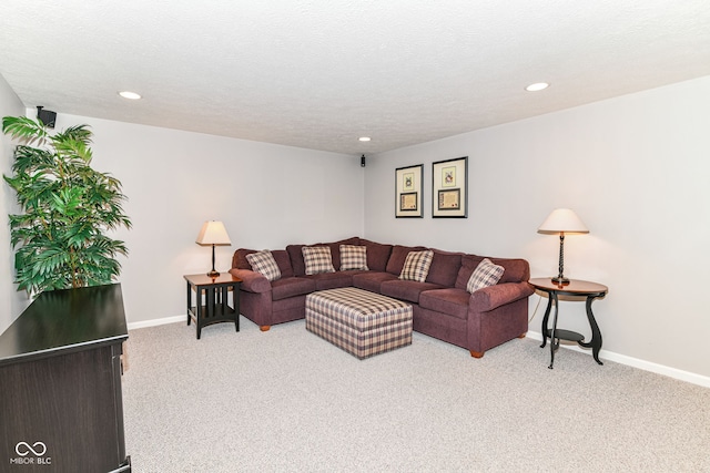 living area with baseboards, carpet flooring, and recessed lighting