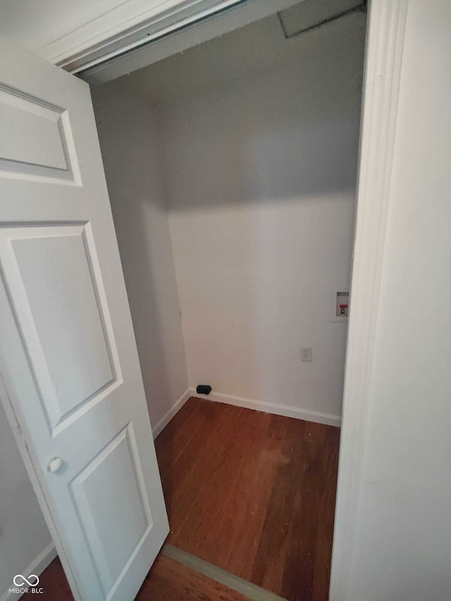 3629 Birchwood Ave, Indianapolis, IN 46205 - laundry area featuring dark wood finished floors and baseboards