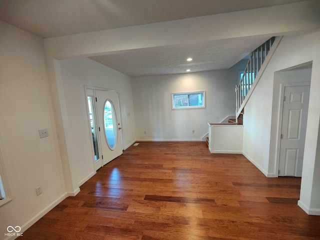 3629 Birchwood Ave, Indianapolis, IN 46205 - foyer entrance featuring recessed lighting, stairs, wood finished floors, and baseboards