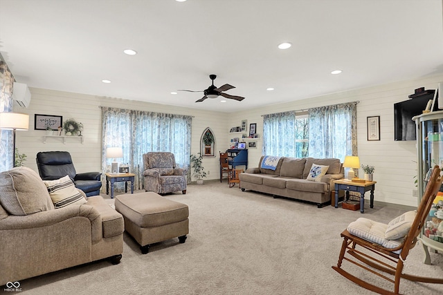 1630 N 400 W, Bargersville, IN 46106 - living area featuring a healthy amount of sunlight, a ceiling fan, and wood walls