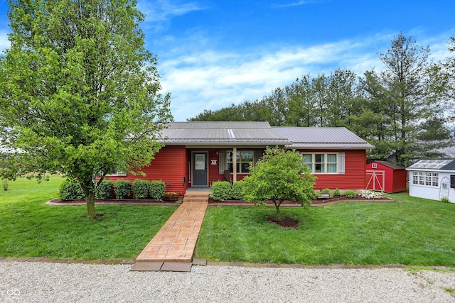 1630 N 400 W, Bargersville, IN 46106 - ranch-style home with a storage shed, a front lawn, and metal roof