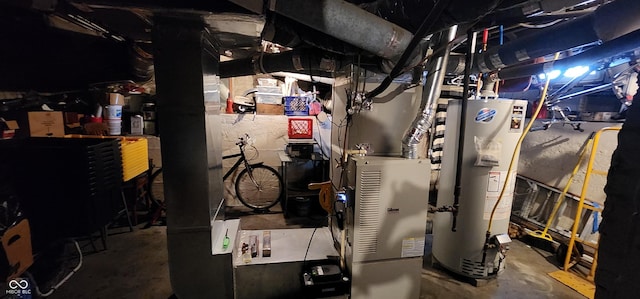 utility room with gas water heater