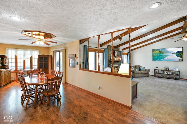 dining area featuring ceiling fan, lofted ceiling with beams, a textured ceiling, recessed lighting, and wood finished floors
