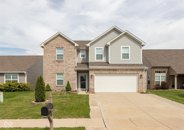 view of front of home featuring brick siding, driveway, a garage, and a front yard