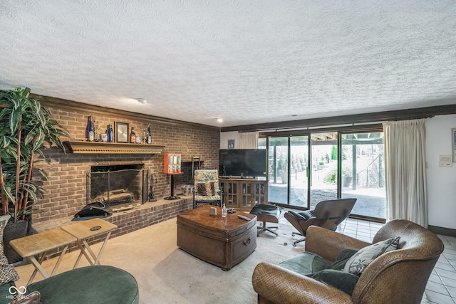 living area featuring brick wall, a fireplace, and a textured ceiling