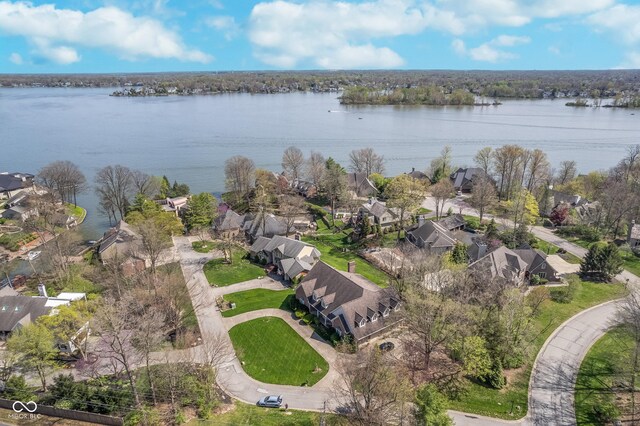 aerial view with a residential view and a water view
