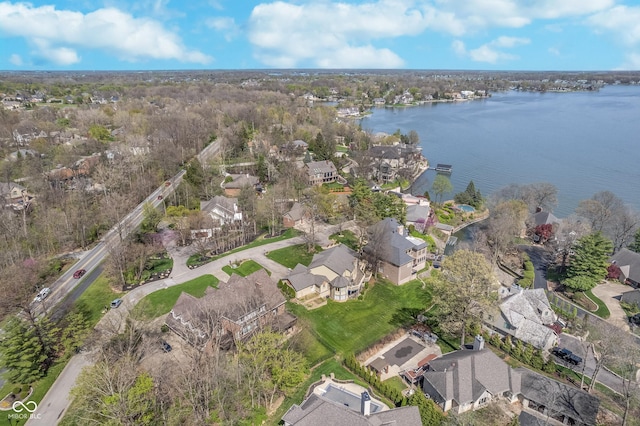 bird's eye view featuring a water view and a residential view