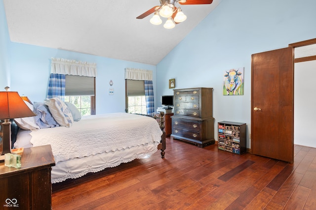 bedroom featuring high vaulted ceiling, ceiling fan, and hardwood / wood-style flooring
