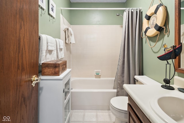 bathroom with shower / bath combo with shower curtain, tile patterned floors, toilet, and vanity
