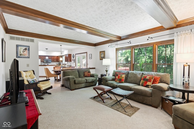 living room featuring visible vents, a textured ceiling, crown molding, and beamed ceiling