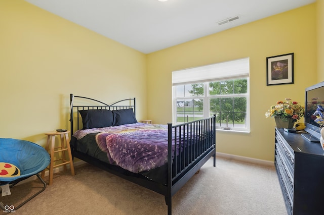1666 Huntzinger Blvd, Pendleton, IN 46064 - bedroom with light carpet, baseboards, and visible vents