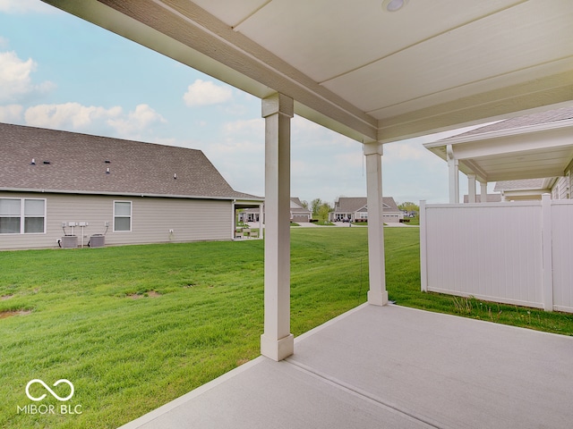 view of patio featuring fence and cooling unit