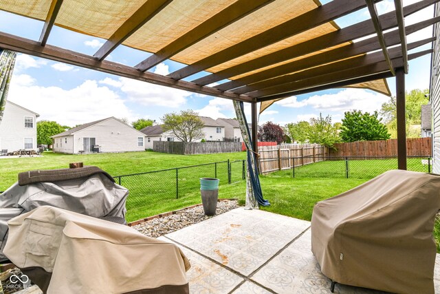 view of patio with grilling area, a pergola, and a residential view