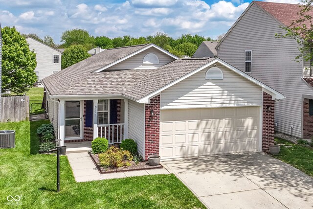 traditional home featuring brick siding, a garage, a shingled roof, a porch, and concrete driveway