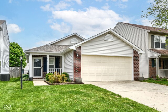 view of front facade featuring driveway, a garage, brick siding, and a porch