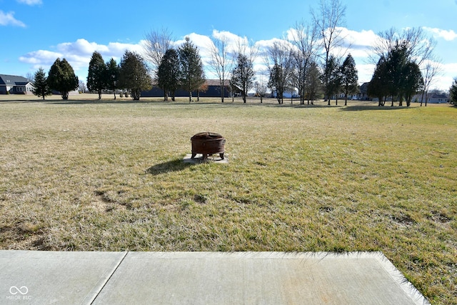 1623 W Stoneybrook Ln, Crawfordsville, IN 47933 - view of grassy yard featuring an outdoor fire pit