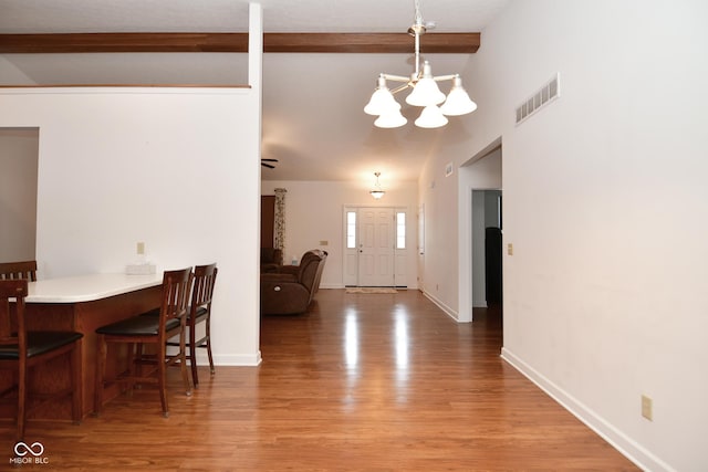 1623 W Stoneybrook Ln, Crawfordsville, IN 47933 - dining room featuring a chandelier, light wood-style floors, and baseboards