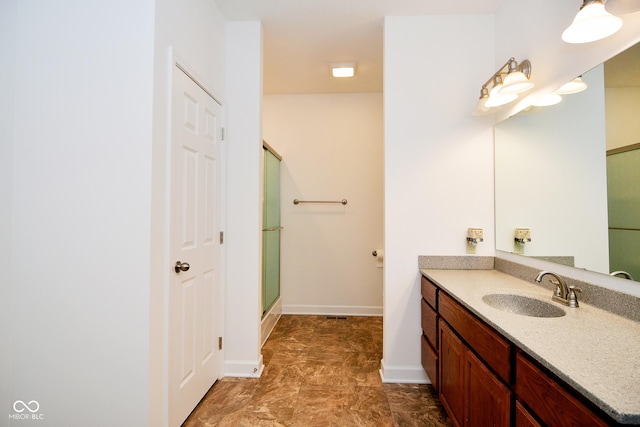 1623 W Stoneybrook Ln, Crawfordsville, IN 47933 - bathroom with vanity, an enclosed shower, and baseboards