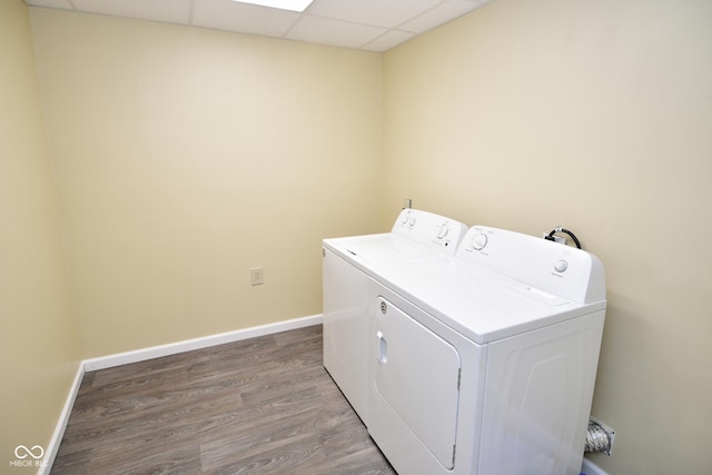 1623 W Stoneybrook Ln, Crawfordsville, IN 47933 - washroom featuring washer and dryer, wood finished floors, and baseboards
