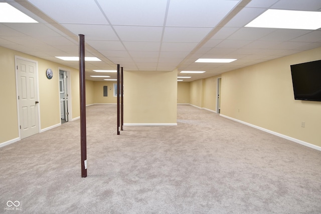 1623 W Stoneybrook Ln, Crawfordsville, IN 47933 - finished below grade area with carpet, a paneled ceiling, and baseboards
