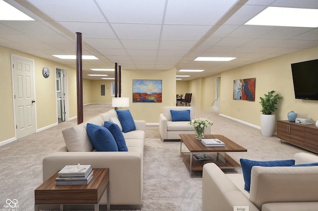 1623 W Stoneybrook Ln, Crawfordsville, IN 47933 - carpeted living area featuring a paneled ceiling and baseboards