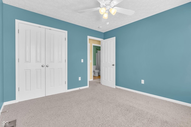 15329 Smithfield Dr, Westfield, IN 46074 - unfurnished bedroom featuring a ceiling fan, a textured ceiling, baseboards, a closet, and carpet flooring