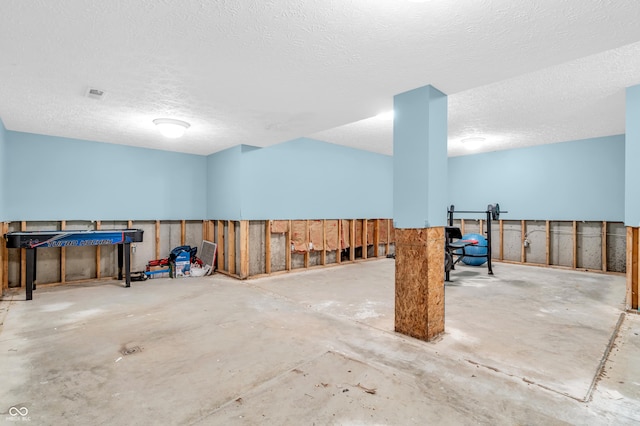 15329 Smithfield Dr, Westfield, IN 46074 - below grade area with a textured ceiling and visible vents