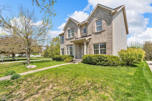 15329 Smithfield Dr, Westfield, IN 46074 - traditional-style house featuring brick siding and a front lawn