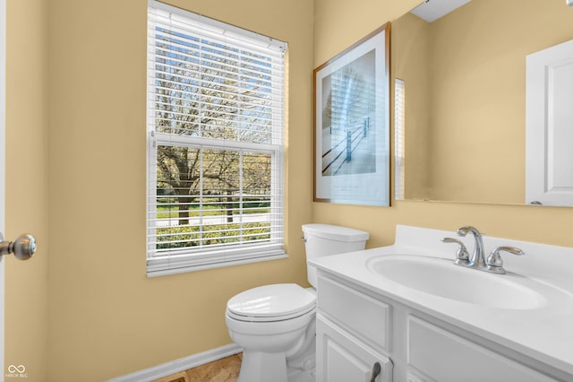 15329 Smithfield Dr, Westfield, IN 46074 - half bath featuring vanity, baseboards, a wealth of natural light, and toilet