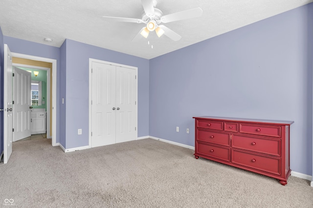 15329 Smithfield Dr, Westfield, IN 46074 - unfurnished bedroom featuring a ceiling fan, baseboards, carpet, and a closet