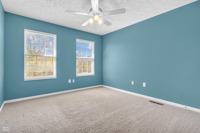15329 Smithfield Dr, Westfield, IN 46074 - empty room featuring visible vents, carpet, a textured ceiling, and baseboards