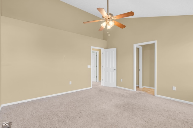 15329 Smithfield Dr, Westfield, IN 46074 - unfurnished bedroom with a ceiling fan, baseboards, light carpet, and high vaulted ceiling