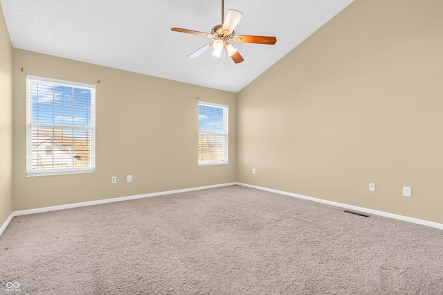 15329 Smithfield Dr, Westfield, IN 46074 - carpeted empty room featuring a ceiling fan, baseboards, visible vents, and high vaulted ceiling