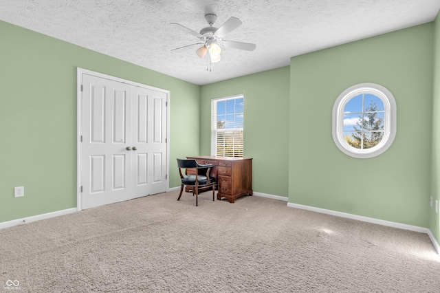 15329 Smithfield Dr, Westfield, IN 46074 - office area featuring carpet floors, a textured ceiling, baseboards, and ceiling fan