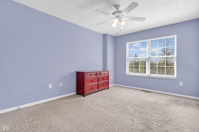 15329 Smithfield Dr, Westfield, IN 46074 - carpeted empty room featuring baseboards, a ceiling fan, a textured ceiling, and visible vents