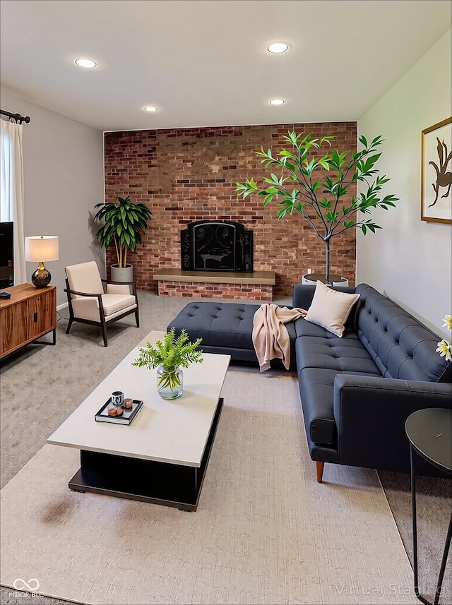 carpeted living room with recessed lighting and brick wall