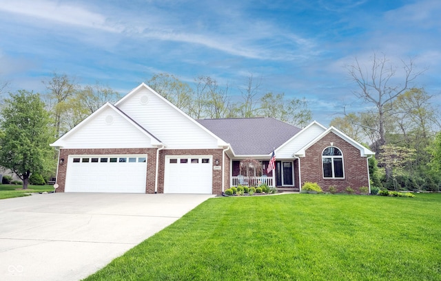 ranch-style home featuring a porch, an attached garage, brick siding, concrete driveway, and a front lawn