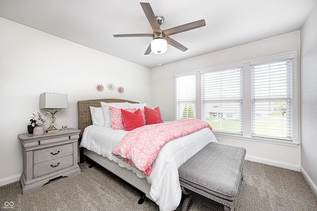 bedroom featuring carpet flooring, baseboards, and ceiling fan
