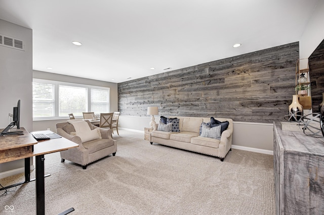 living room with carpet flooring, recessed lighting, and visible vents