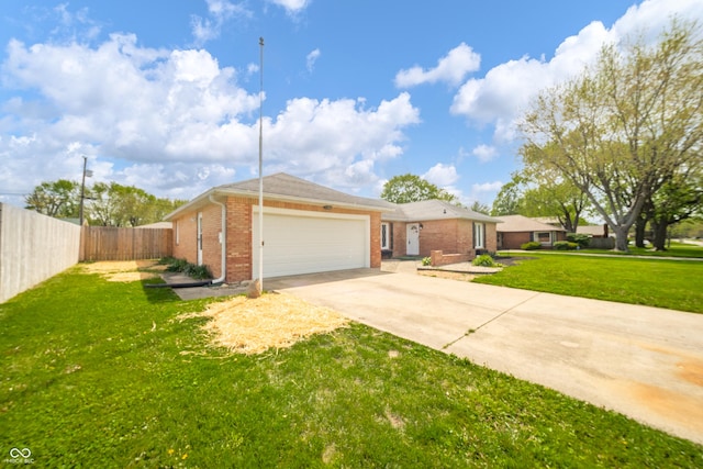 view of front of property featuring a front lawn, fence, brick siding, concrete driveway, and an attached garage
