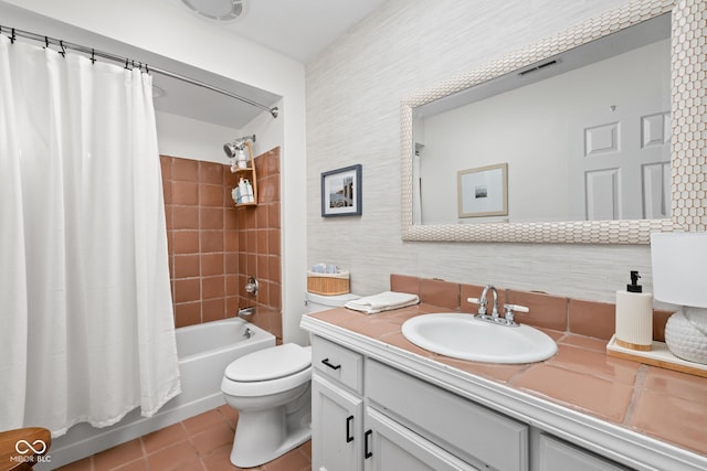 full bathroom featuring shower / bath combo, vanity, toilet, tile patterned floors, and visible vents