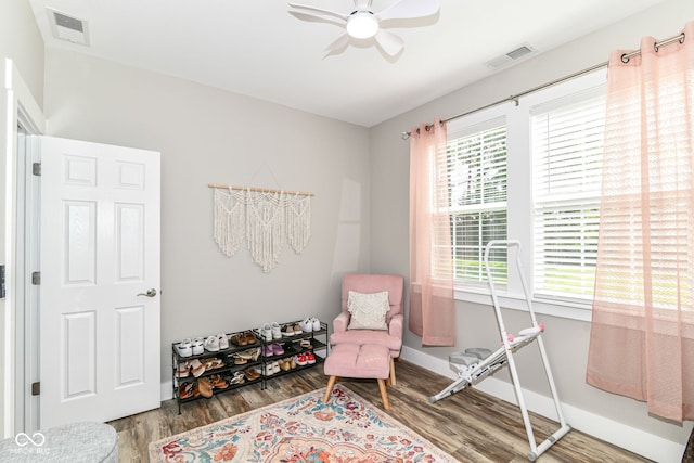 6301 Prospect St, Indianapolis, IN 46203 - living area with wood finished floors, ceiling fan, and baseboards