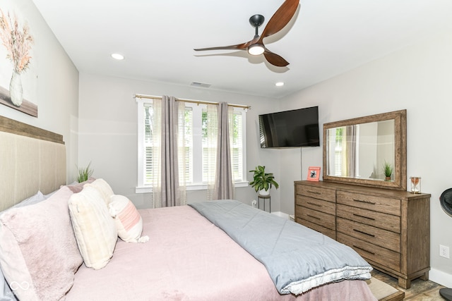 6301 Prospect St, Indianapolis, IN 46203 - bedroom featuring ceiling fan, baseboards, and recessed lighting
