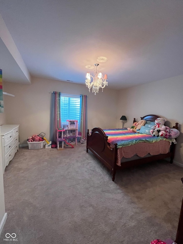 bedroom with an inviting chandelier and carpet flooring
