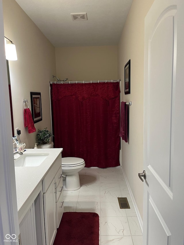 full bathroom with toilet, visible vents, marble finish floor, and vanity