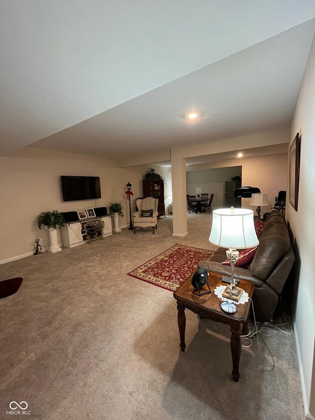 living area with baseboards, carpet, and recessed lighting